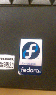 File:Fedora-powered-by-case-badge-photo.png